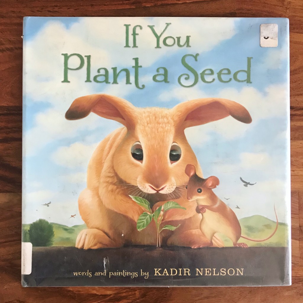 A photo of a picture book cover. A rabbit and a mouse look intently at a small sprout coming out of the ground. The title "If You Plant a Seed" is written in green text at the top, and at the bottom of the cover it says "words and paintings by Kadir Nelson." 